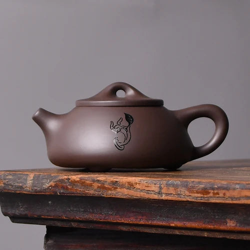 150ml Classic Yixing Purple Clay Teapot Handmade Zhu Mud Stone Scoop Kettle Ball Hole Filter Tea Infuser Chinese Zisha Tea Sets