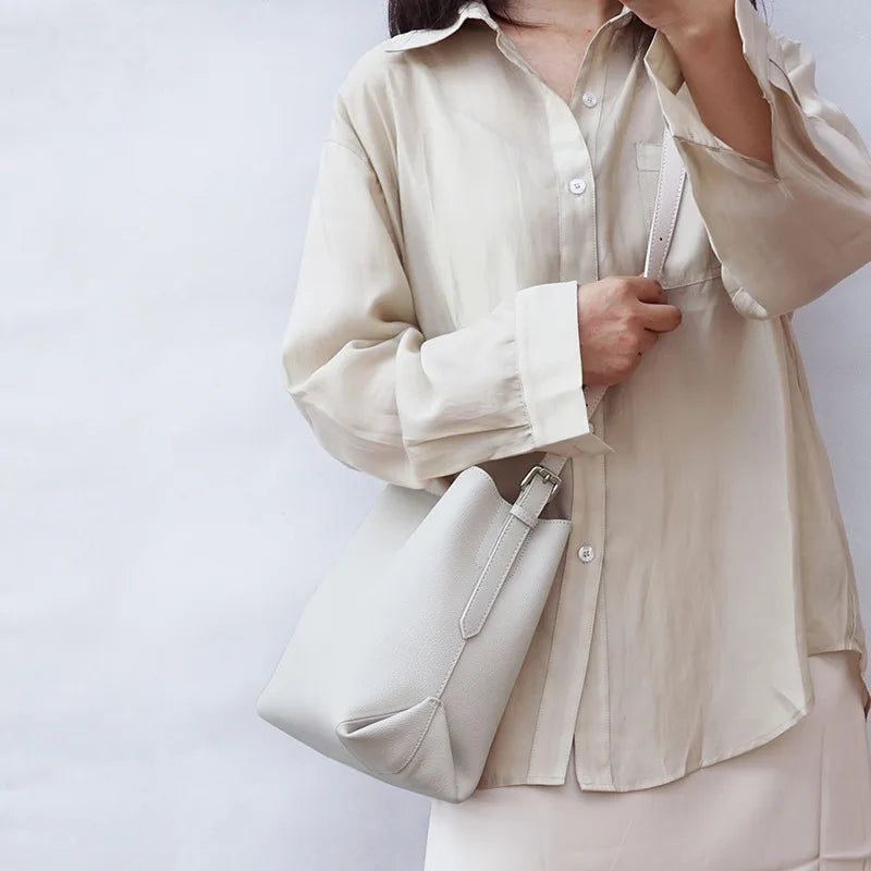 2024 New Cowhide Genuine Leather Bucket Bag Simple Large Capacity Elegant Commuter Shoulder Bags Luxury Solid Color Tote Purses