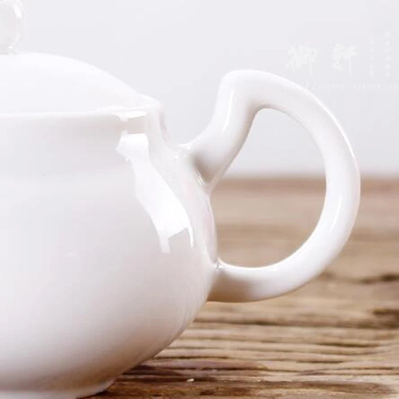 Bone China Handmade Ruyi Pot, Ceramic Black Tea Maker, White Porcelain Household Filter Flower Tea Teapot