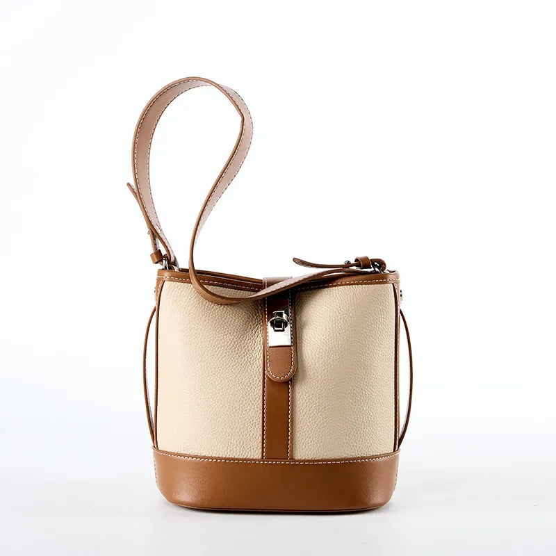 Bucket bag for women's new 2024 popular top layer leather women's bag, cowhide niche design, handheld commuting crossbody bag