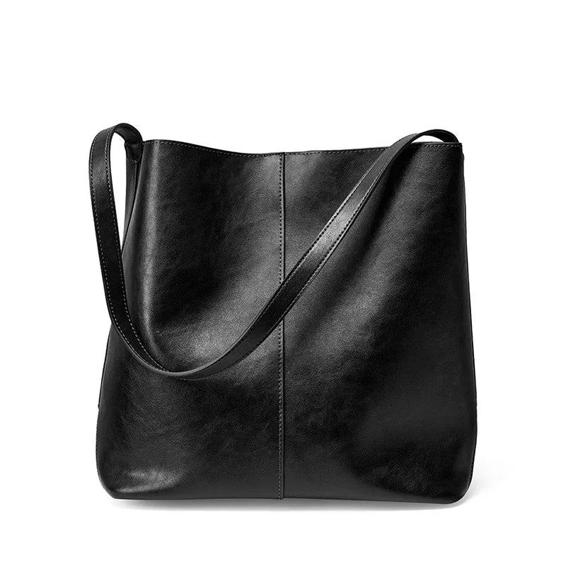Genuine leather bucket bag, high-end niche tote bag, large capacity single shoulder crossbody bag, new for commuting in 2024