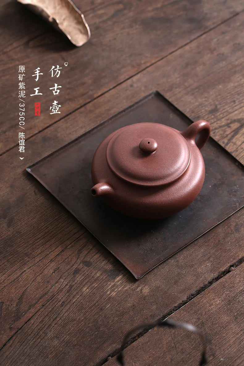 Yixing recommended undressed ore famous tea tea set manually set household archaize of purple clay pot flat belly 375 ml