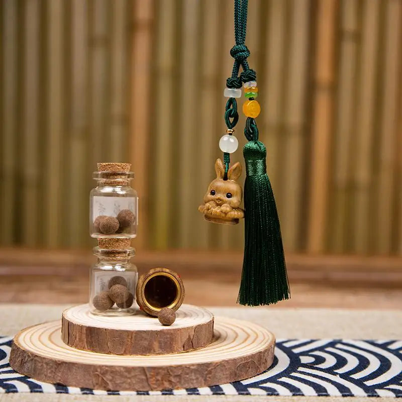 Green sandalwood carved cute hollow rabbit fragrance expander pendant sachet autumn vintage windmill interior pendant