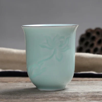 longquan celadon porcelain tea cup master carved lotus water lily engraved ceramic coffee cup one piece porcelain cups 130ml