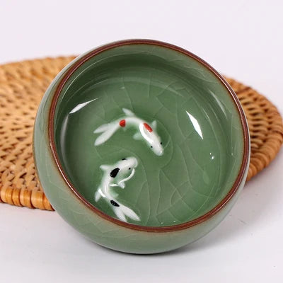 one tea cup longquan celadon porcelain fish relief carved kungfu cup of tea geyao crackle glaze master cup diyao craft in China