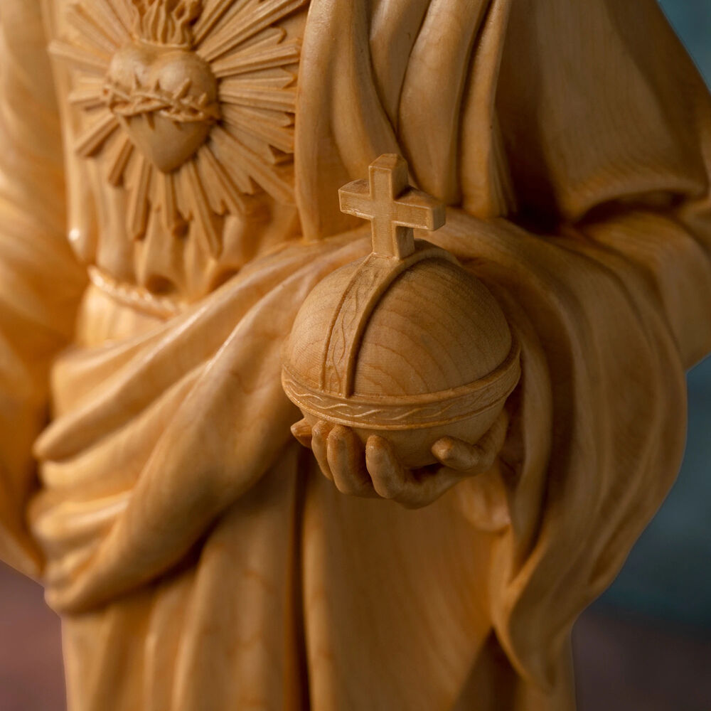 juniper Jesus statue Sacred Heart prayer wood carving Christian altar sculpture