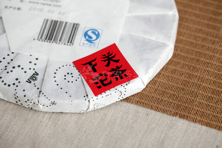 Jin Bang Series T8653 Tie Bing * 2015 Xiaguan Pu'er Pu-erh Raw Green Tea 357g