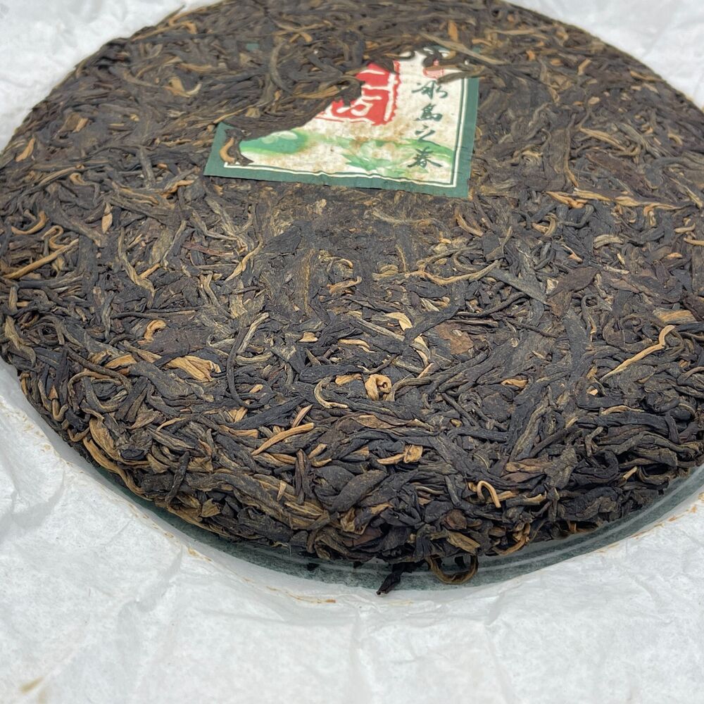 Pu'er Tea, 2009, Ice Island Spring Iceland Spring, 357 grams, raw