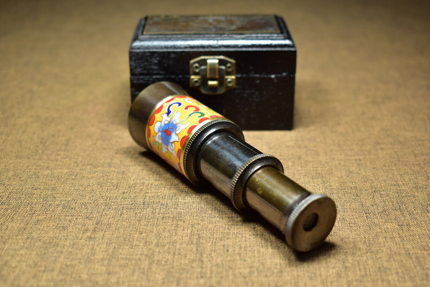 The ancient brass cloisonne monocular telescope