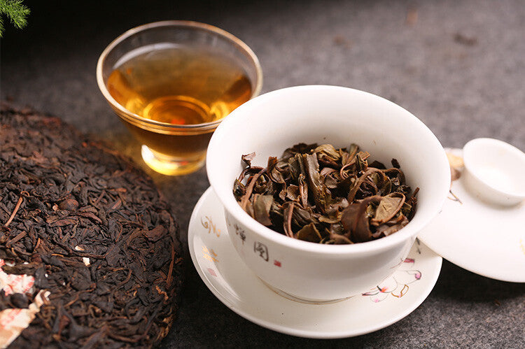 2003 Kong Ming Shan Pressed Qizi Cake of Yiwu Classic Tea Puerh Puer Raw 357g
