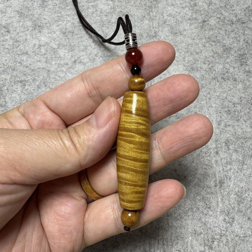 Golden Nanmu Ebony Pendant 1.89*0.47in Wave Grain Dzi Bead Shape Unisex Handmade