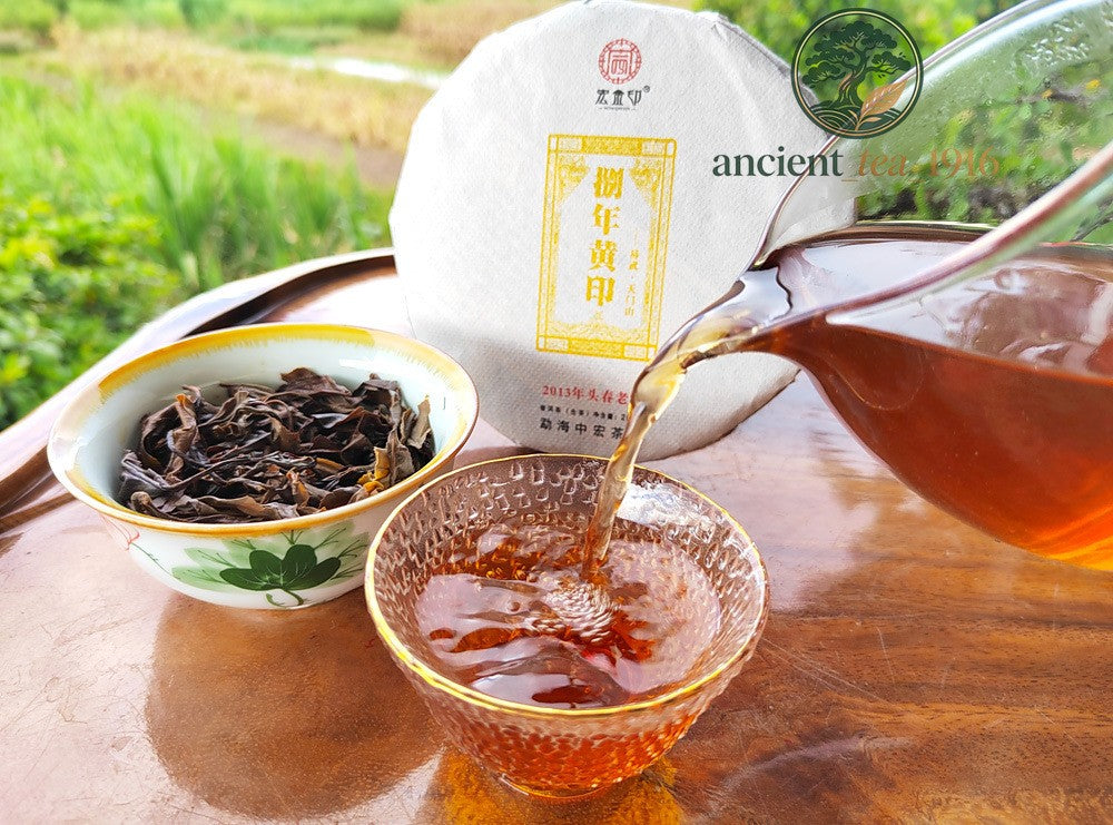 200g 2013 Yi Wu Raw Tea Ancient Tree Yunnan Pu Erh Tea Cake