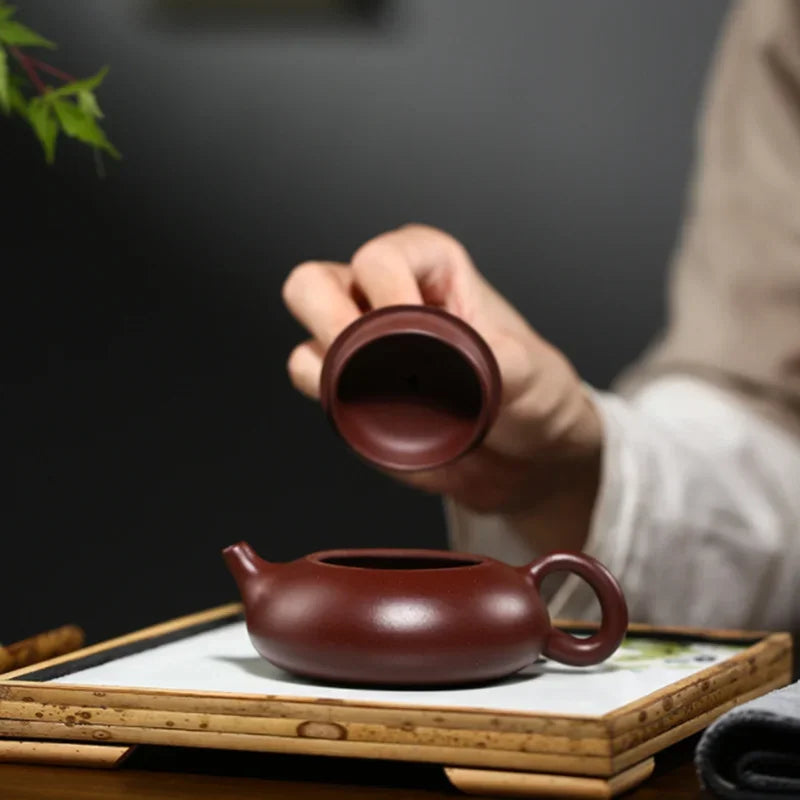150ML Yixing Purple Clay Teapot Real Handmade Chinese Flat Xishi Kettle Puer Tea Set Kung Fu Zisha Teaware