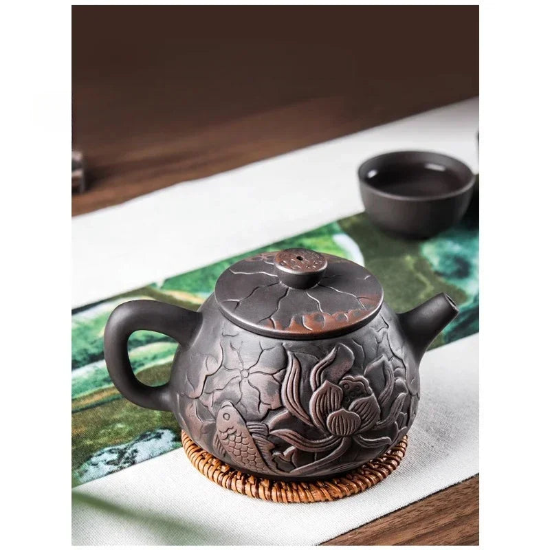 1pc Yixing Tea Pot Purple Clay Teapots Beauty Kettle Black Mud Hand Hand Carved Lotus Illustration Pot Home Handmade Tea Set