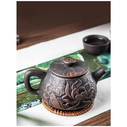 1pc Yixing Tea Pot Purple Clay Teapots Beauty Kettle Black Mud Hand Hand Carved Lotus Illustration Pot Home Handmade Tea Set