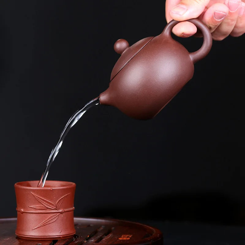 200cc Yixing tea pot purple clay Xishi teapot beauty kettle Raw ore Handmade Tea set authentic Tie Guanyin Puer ball hole filter