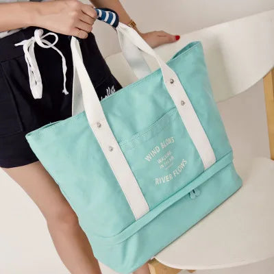 2018 Ruil new fashion canvas travelbag fashion men shoulder bags ladies large capacity lever shoulder bag Mummy bag
