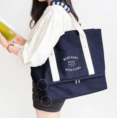 2018 Ruil new fashion canvas travelbag fashion men shoulder bags ladies large capacity lever shoulder bag Mummy bag