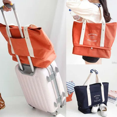 2018 Ruil new fashion canvas travelbag fashion men shoulder bags ladies large capacity lever shoulder bag Mummy bag