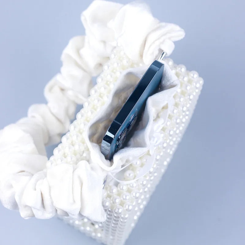 2023 New sweet one-shoulder hand-woven white beaded hollowed out square pearl handbag female woven mobile phone bag