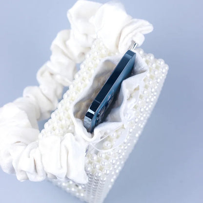 2023 New sweet one-shoulder hand-woven white beaded hollowed out square pearl handbag female woven mobile phone bag