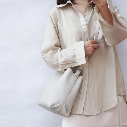 2024 New Cowhide Genuine Leather Bucket Bag Simple Large Capacity Elegant Commuter Shoulder Bags Luxury Solid Color Tote Purses