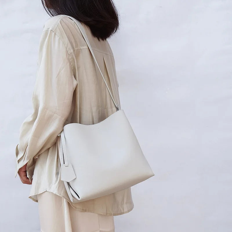 2024 New Cowhide Genuine Leather Bucket Bag Simple Large Capacity Elegant Commuter Shoulder Bags Luxury Solid Color Tote Purses