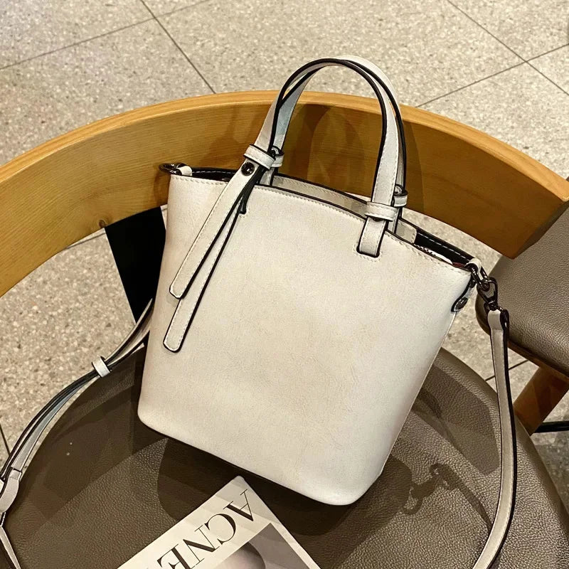 2024 New Female Handbag Cowhide Messenger Fashion One-shoulder Bucket Lady Travel Bag