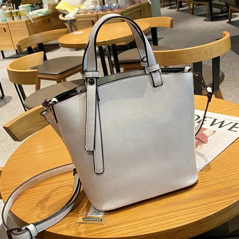 2024 New Female Handbag Cowhide Messenger Fashion One-shoulder Bucket Lady Travel Bag