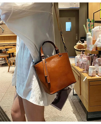 2024 New Female Handbag Cowhide Messenger Fashion One-shoulder Bucket Lady Travel Bag
