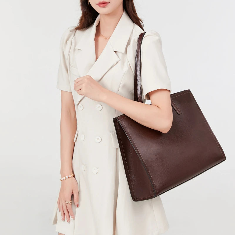 2024 New High Quality Cowhide Tote Bags Women Simple Commuter Large Capacity Soft Handbags Female Minority Ligh Luxury Purses