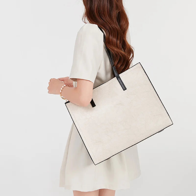 2024 New High Quality Cowhide Tote Bags Women Simple Commuter Large Capacity Soft Handbags Female Minority Ligh Luxury Purses