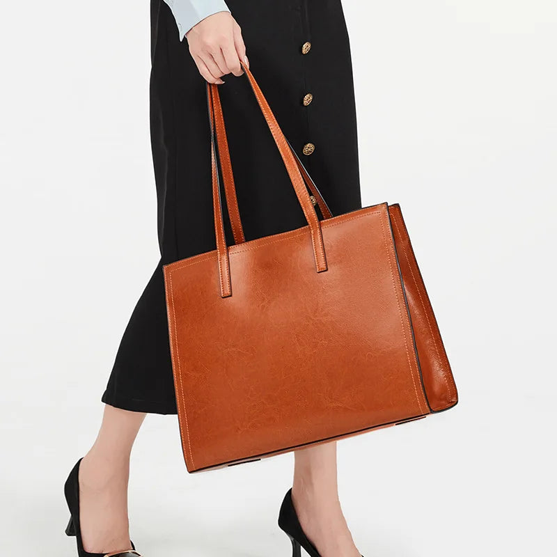 2024 New High Quality Cowhide Tote Bags Women Simple Commuter Large Capacity Soft Handbags Female Minority Ligh Luxury Purses