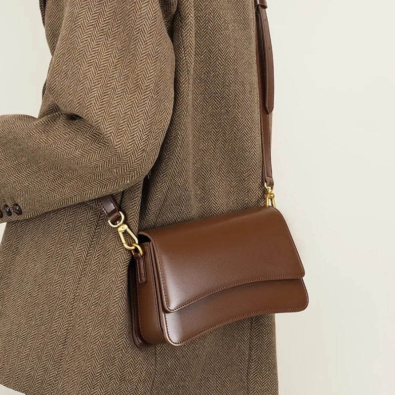 2024 New Versatile One Shoulder Crossbody Cowhide Small and Popular Dharma Stick Bag High end Underarm Women's Bag