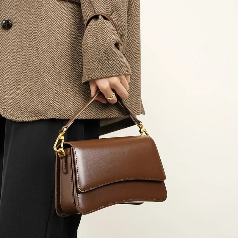 2024 New Versatile One Shoulder Crossbody Cowhide Small and Popular Dharma Stick Bag High end Underarm Women's Bag