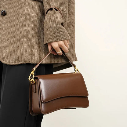 2024 New Versatile One Shoulder Crossbody Cowhide Small and Popular Dharma Stick Bag High end Underarm Women's Bag