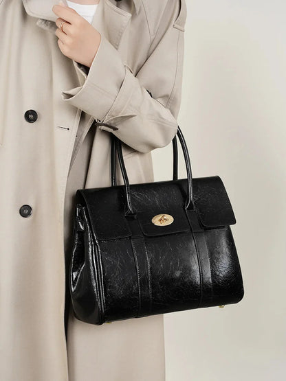 2024 Spring New women's large-capacity black genuine leather Tote fashion cowhide hand retro lawyer envelope bag