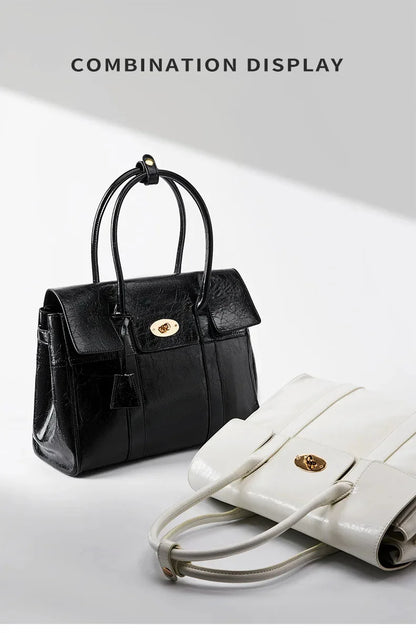 2024 Spring New women's large-capacity black genuine leather Tote fashion cowhide hand retro lawyer envelope bag