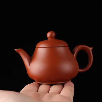 Zisha pot Chinese teapot filter Xishi teapot raw ore purple mud handmade tea set 130ml