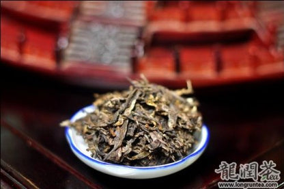 Yunnan Longrun Pu-erh Tea Cake- Plum Blossom (Year 2011, Unfermented)357g