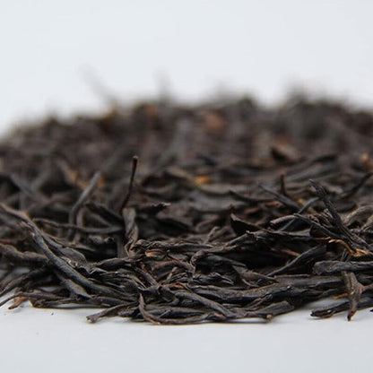 Dian Hong Black Tea Yunnan Old Tree Straight Strip Cooked Tea 500g