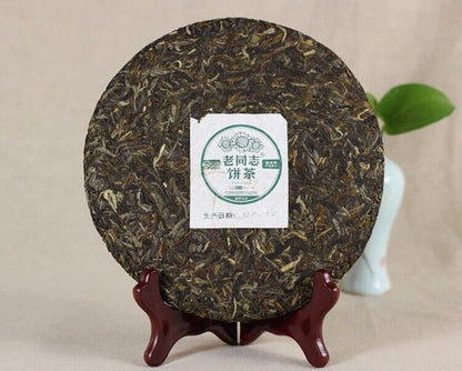 357g,China "Lao Tong Zhi"9948 Menghai Pu erh RAW Tea Cake,Old Comrade puer 141