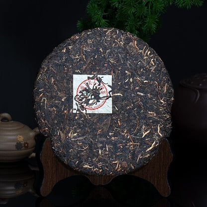2010 CHI TSE Raw Puer Tea Iron Cake T8653 XiaGuan Tuocha Ancient Tree Pu'er 357g