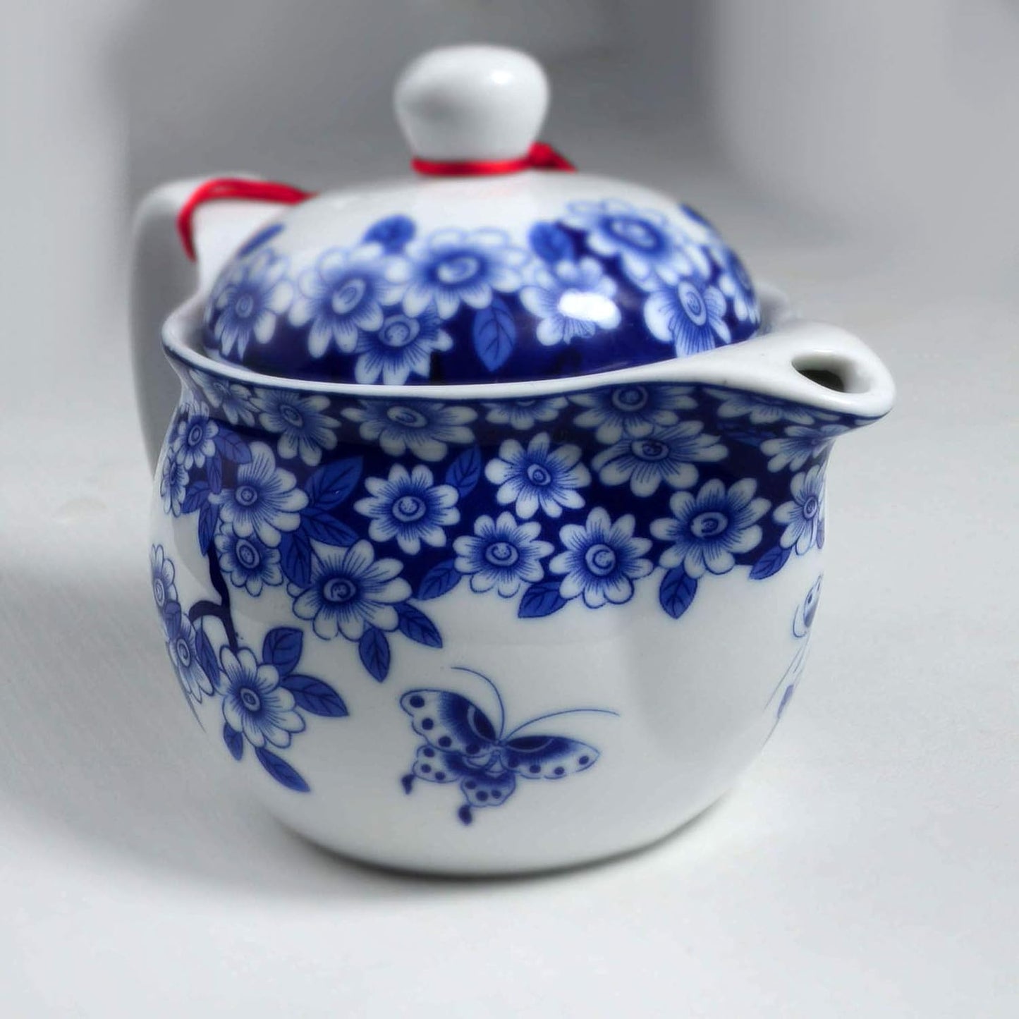 Yxhupot Teapot 350ml Blue and White Flower Porcelain Tea Pot with Infuser Classic Water Pot (Flowers butterfly)