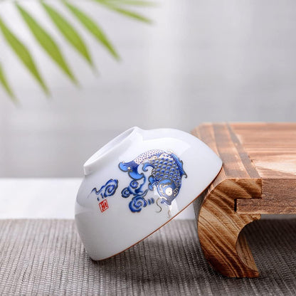 Liang baobao Chinese Tea Tasting Cup Set of 4, 2oz White Porcelain Mini Cups for Gongfu Tea Ceremony (Fish jump)