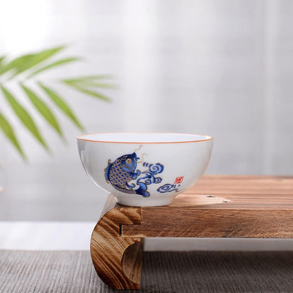 Liang baobao Chinese Tea Tasting Cup Set of 4, 2oz White Porcelain Mini Cups for Gongfu Tea Ceremony (Fish jump)