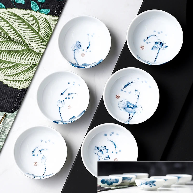 6pcs/lot tea cup handpainted Jingdezhen porcelain kungfu tea cups lotus flower fish print Pu'er cup of tea on sales Chinese cups