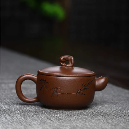 70ml master pot Chinese character carved small handmade teapot real yixing zisha purple grit sold at a loss China