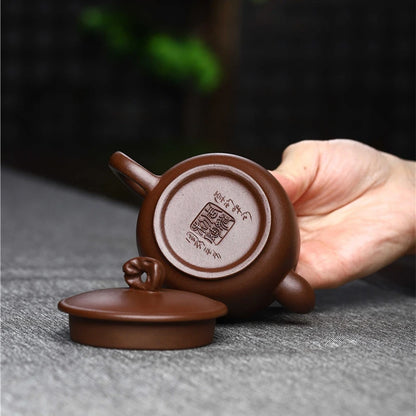 70ml master pot Chinese character carved small handmade teapot real yixing zisha purple grit sold at a loss China