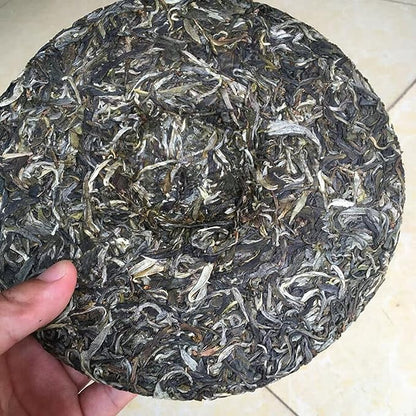 Pu'er Green Tea Yunnan Menghai Spring Pu-Erh Raw Tea Cakes 357g Health Benefits